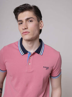Polo with striped edges
