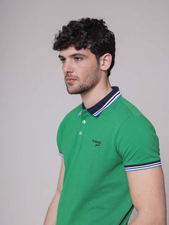 Polo with striped edges