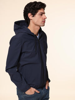 Giubbotto bomber in tessuto tecnico con cappuccio|Colore:Blu